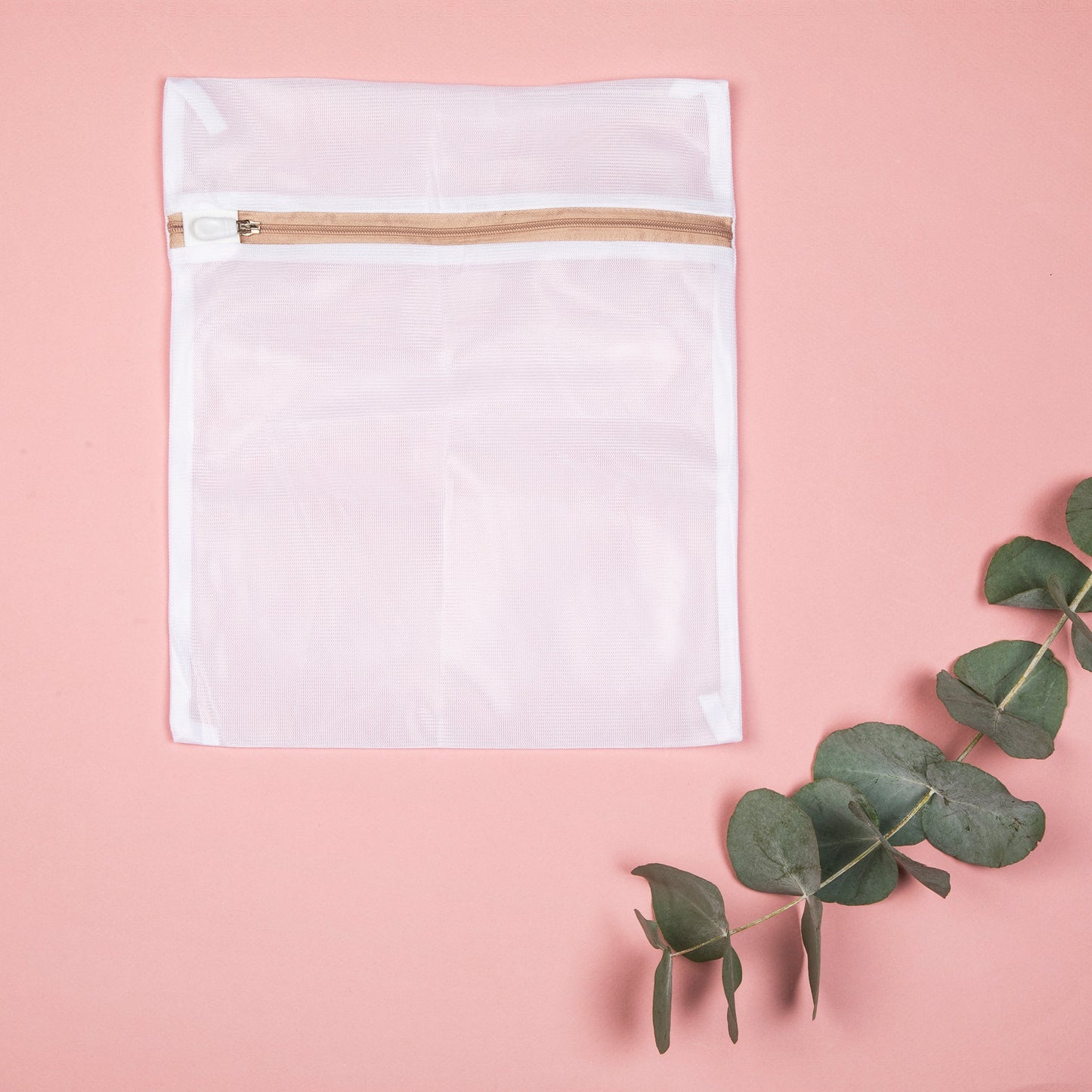 filet de lavage sur fond rose